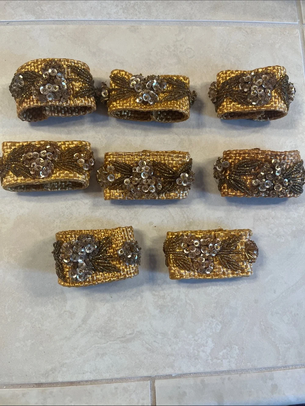 Set of 8 Gold Beaded Cloth Napkin Rings